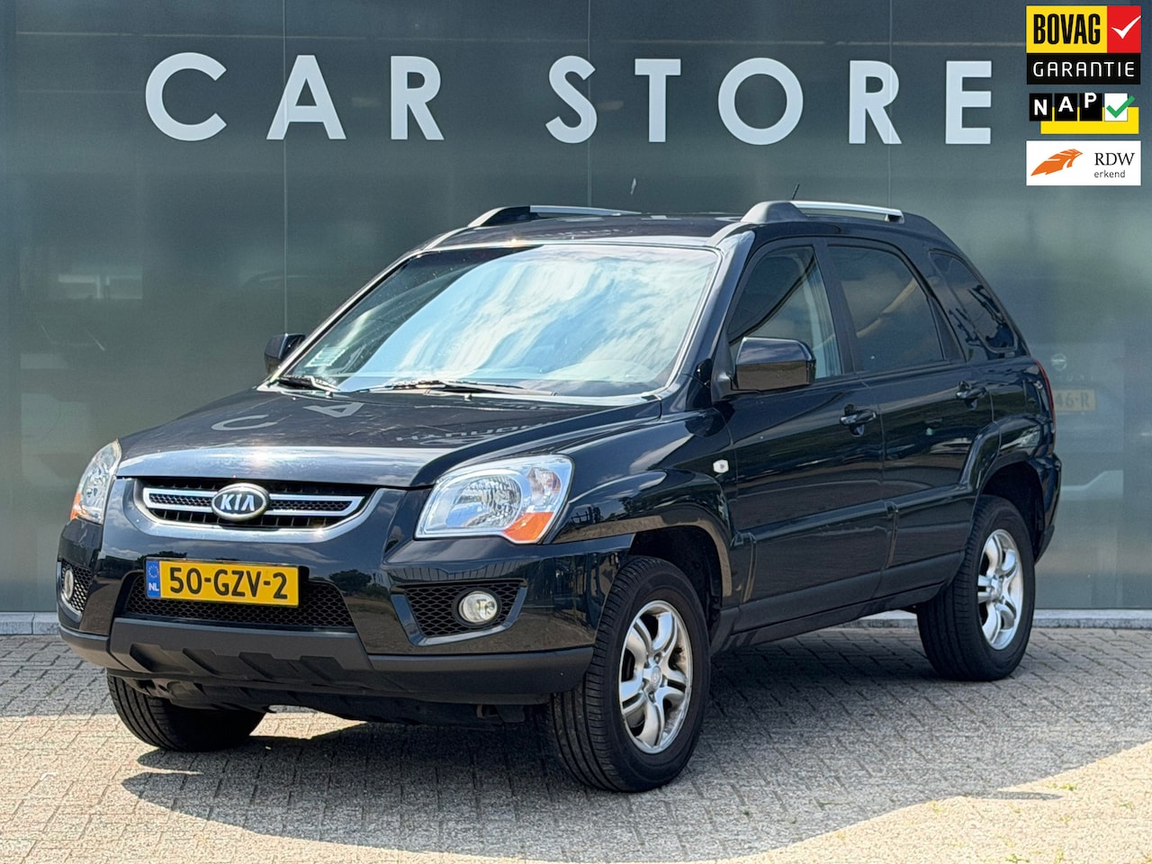 Kia Sportage - 2.0 CVVT X-tra 2.0 CVVT X-tra - AutoWereld.nl