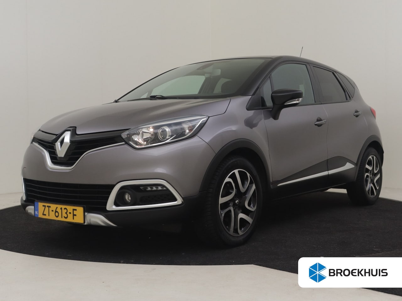 Renault Captur - 1.2 TCe Helly Hansen 120PK AUTO | Navigatie | Achteruitrijcamera | Cruise control | Airco - AutoWereld.nl