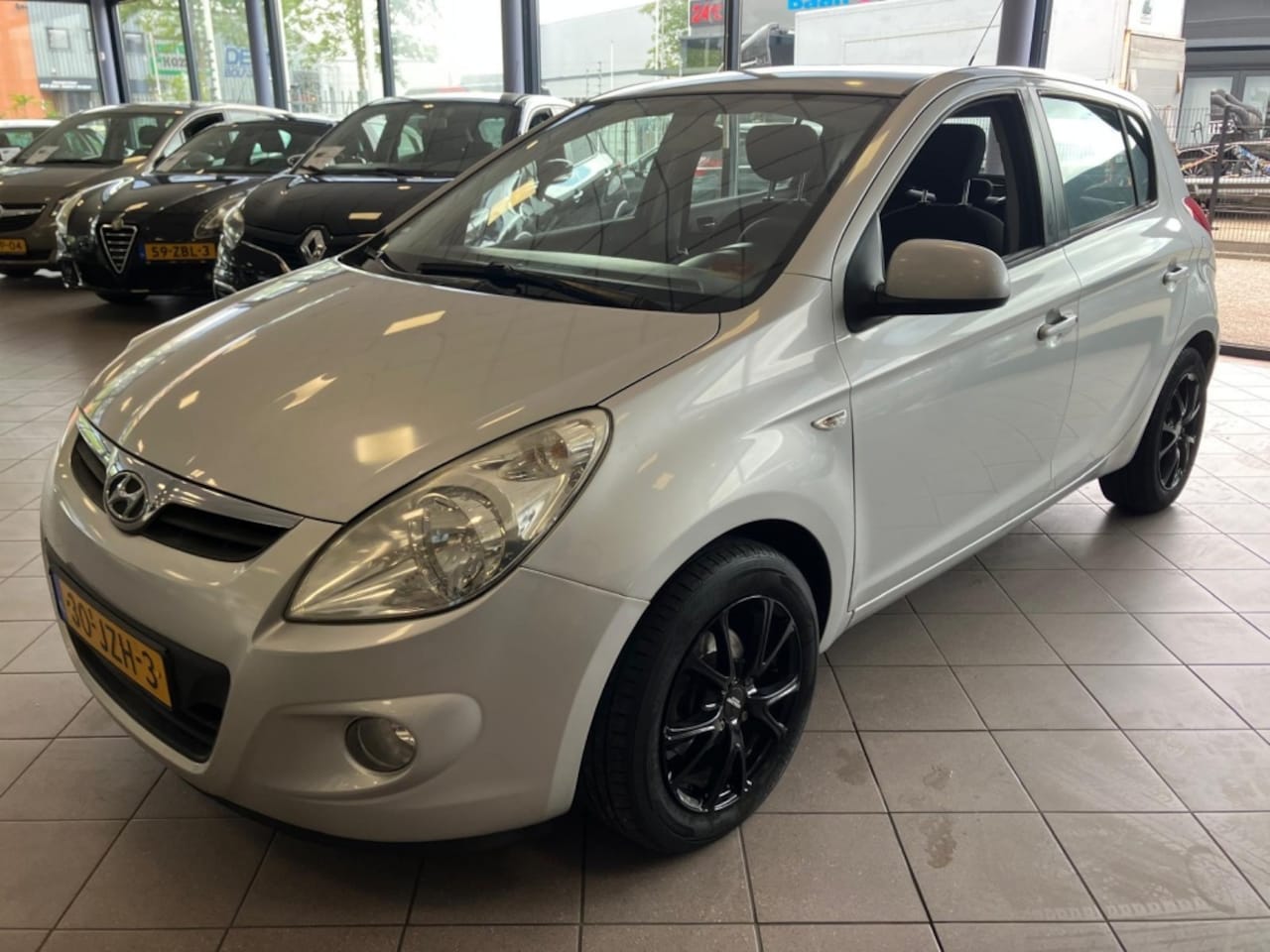 Hyundai i20 - 1.4i Dynamic Airco APK 2-27 BJ 2009 !!! - AutoWereld.nl