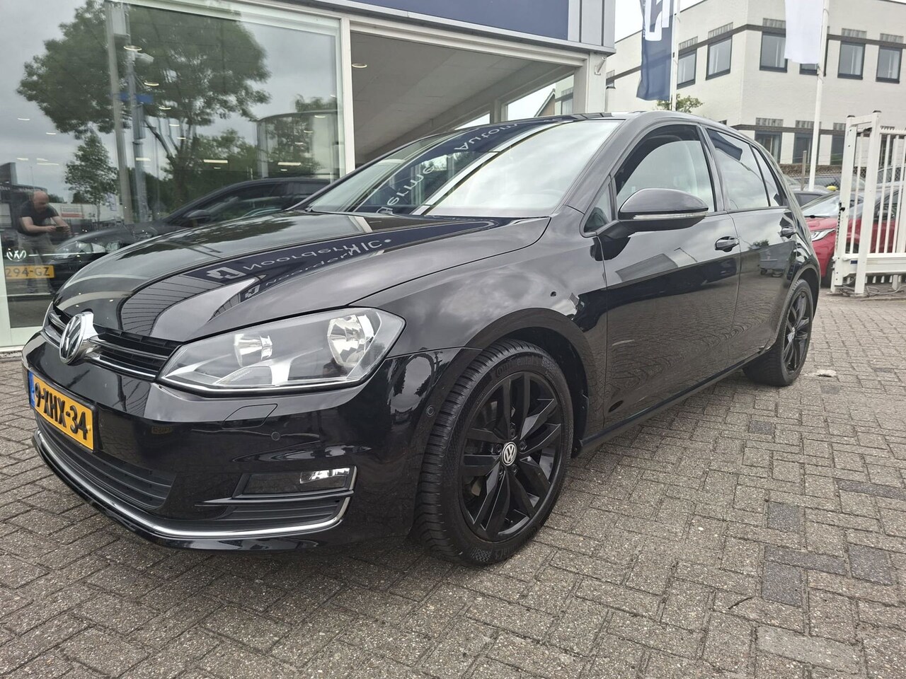 Volkswagen Golf - 1.2 TSI Highline / navigatie / trekhaak / camera - AutoWereld.nl