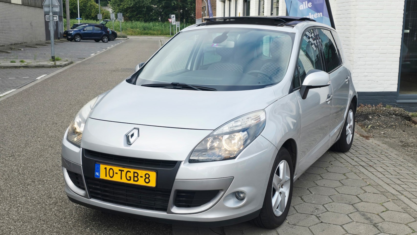 Renault Scénic - 1.4 TCE Parisienne*zeer nette auto*pano*airco ijs*navi*dealer onderhoud*inruil mog!!! - AutoWereld.nl
