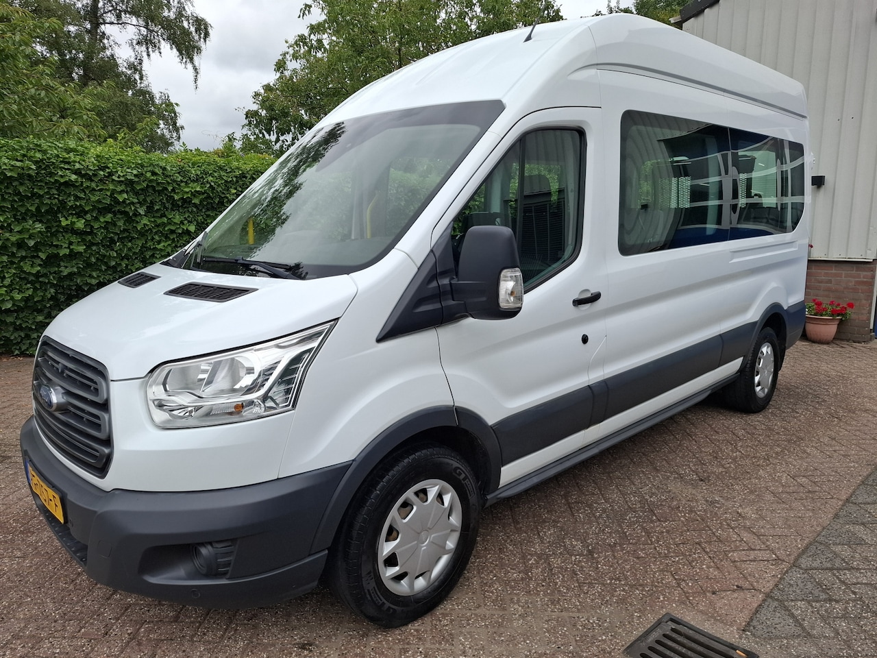 Ford Transit Kombi - 350 2.0 TDCI L3H3 28435.- INCL BTW ROLSTOEL 9-PERS. 130PK - AutoWereld.nl
