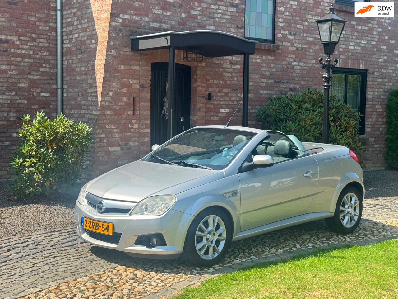 Opel Tigra TwinTop - 1.8-16V Sport airco - AutoWereld.nl