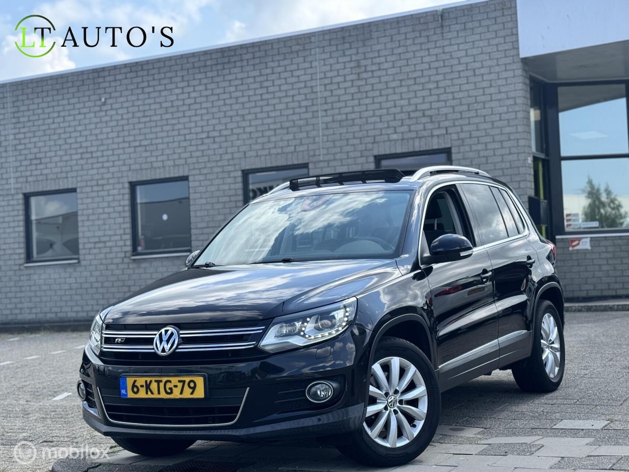Volkswagen Tiguan - 1.4 TSI Sport&Style|Pano Carplay Xenon NAP - AutoWereld.nl