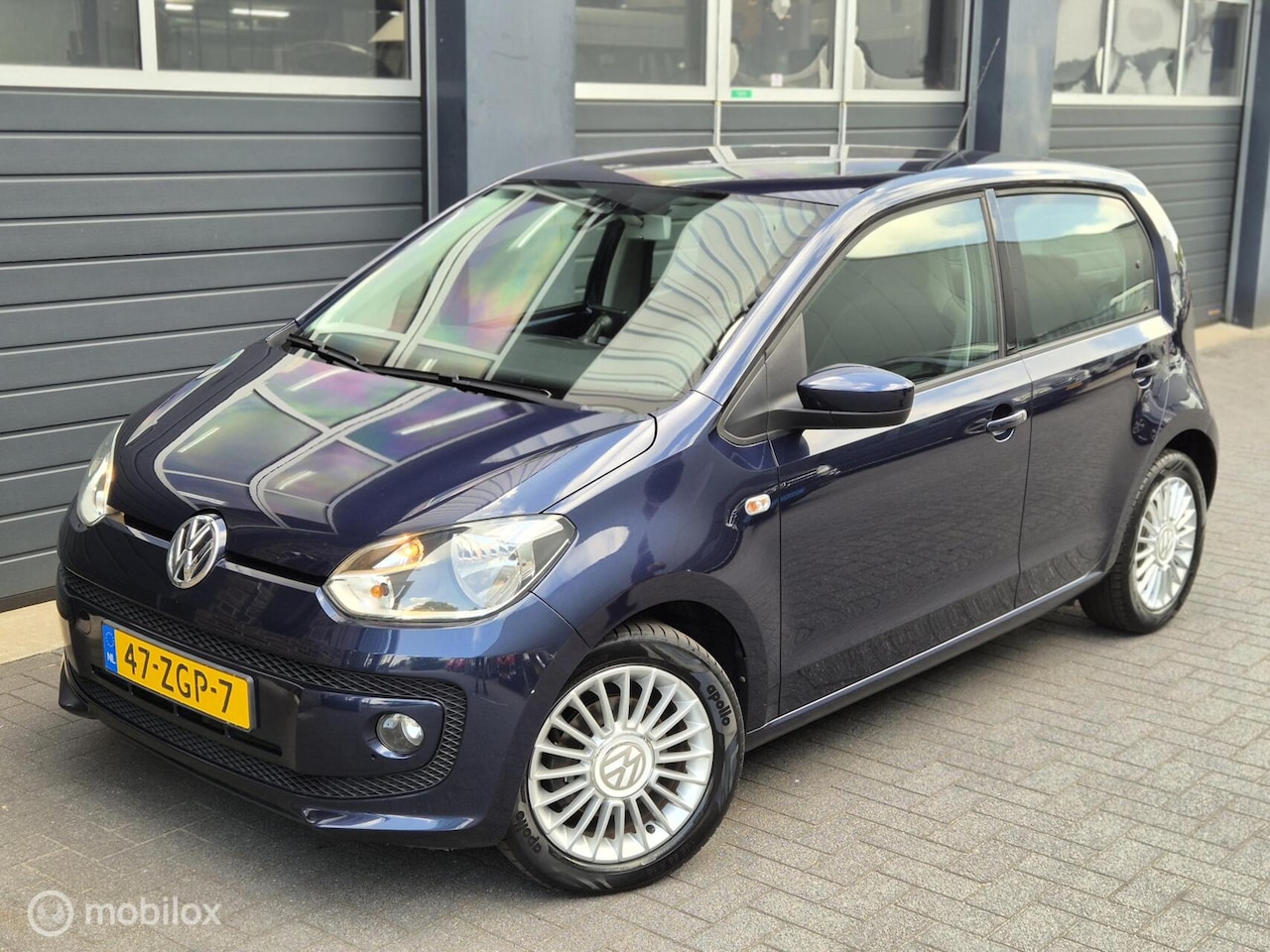 Volkswagen Up! - 1.0 high up! BlueMotion | NAVI | PDC | CRUISE | AIRCO | - AutoWereld.nl