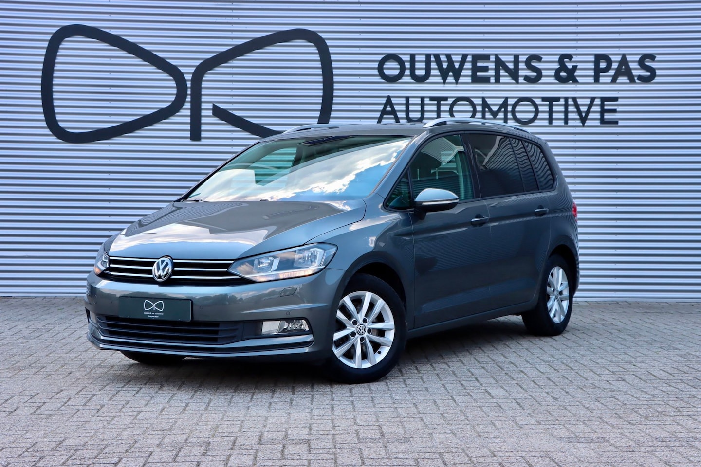 Volkswagen Touran - 1.4 TSI Comfortline 7p | NAVIGATIE | STOELVERWARMING | TREKHAAK - AutoWereld.nl