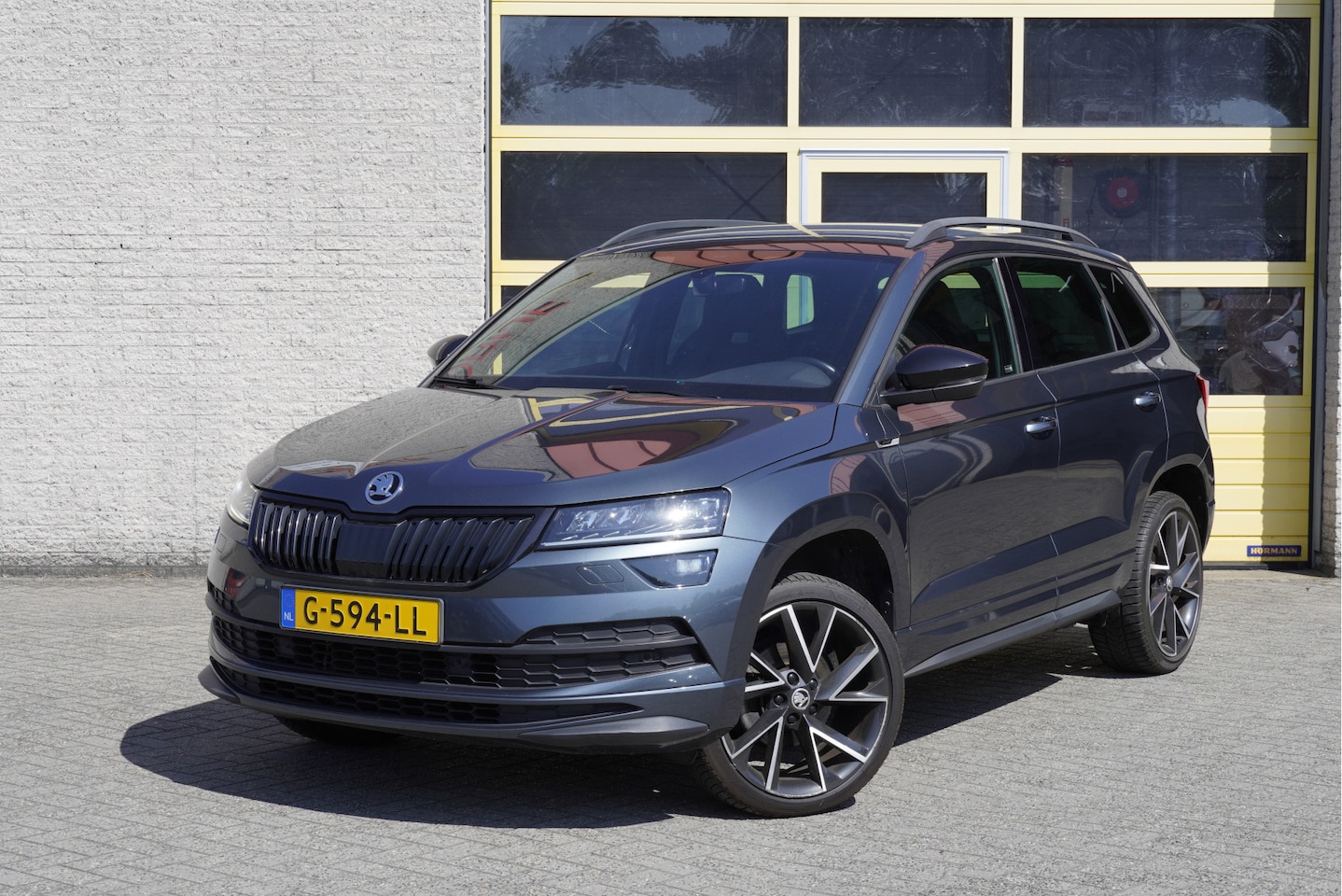Skoda Karoq - 1.5 TSI ACT 150PK! Automaat Sportline Business BJ2019 Lmv 18" | Led | Pdc | Navi | App-Con - AutoWereld.nl