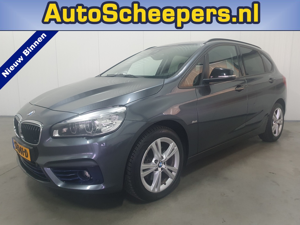 BMW 2-serie Active Tourer - 218i Centennial Executive NAVI/LEDER/CLIMA/TR.HAAK - AutoWereld.nl