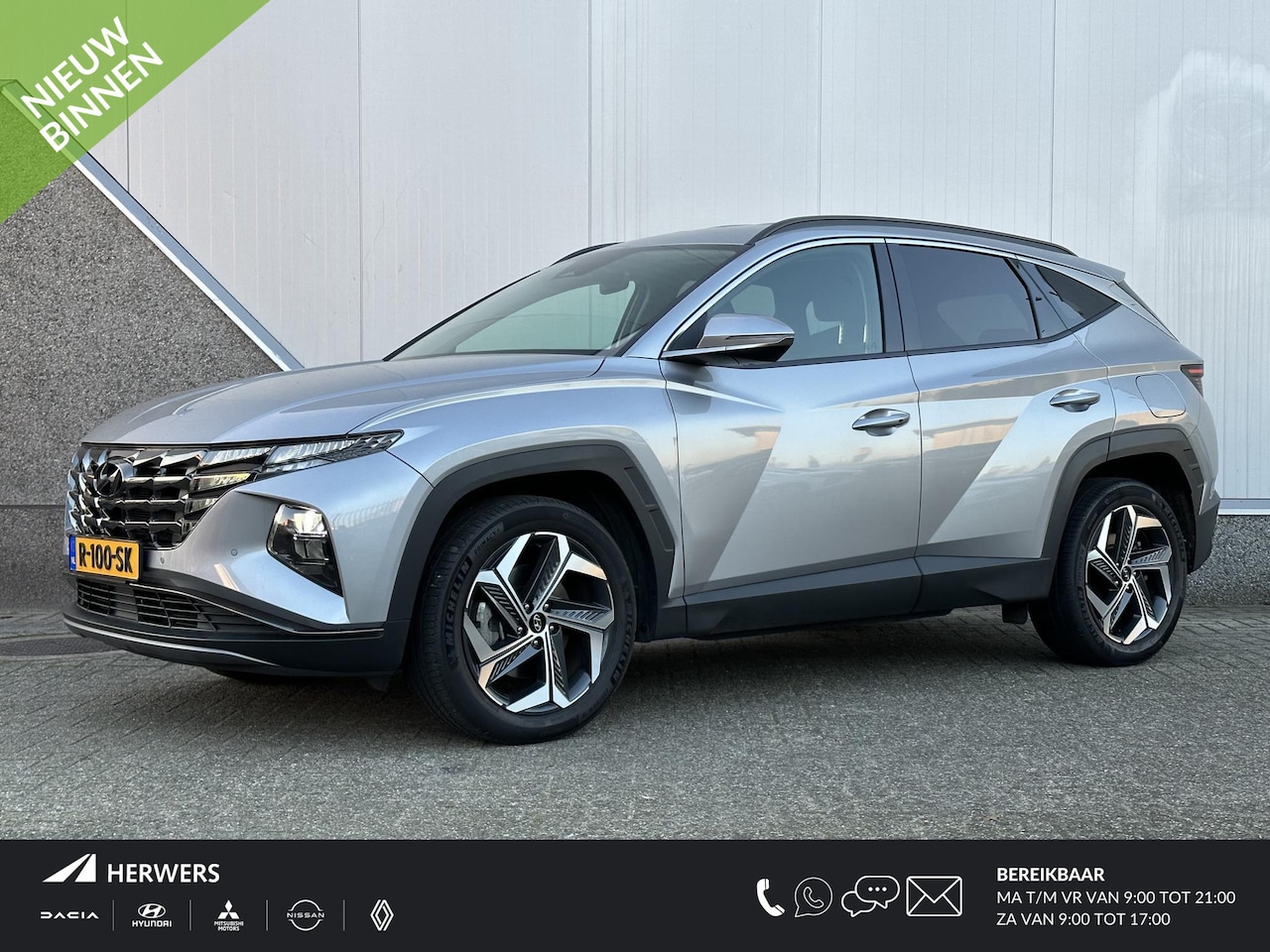 Hyundai Tucson - 1.6 T-GDI HEV Comfort / Navigatie / Camera / Parkeersensoren v + a / Climate Control / 19 - AutoWereld.nl