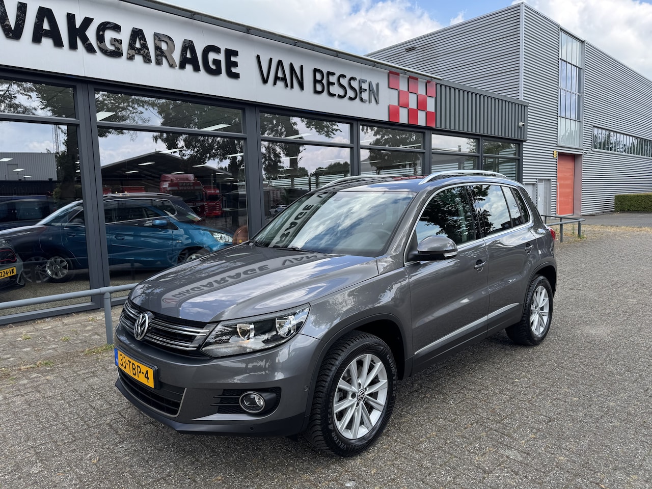 Volkswagen Tiguan - 1.4 TSI Sport&Style LEDER-CLIMA-NAVI - AutoWereld.nl