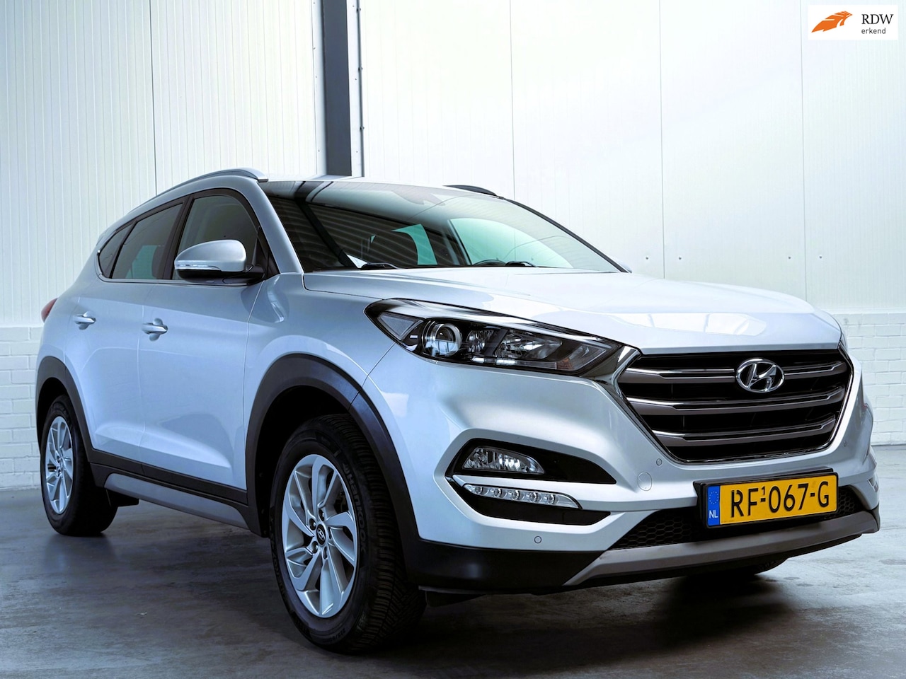 Hyundai Tucson - 1.6 GDi Comfort|Trekhaak|Stoelverwarming|Camera - AutoWereld.nl