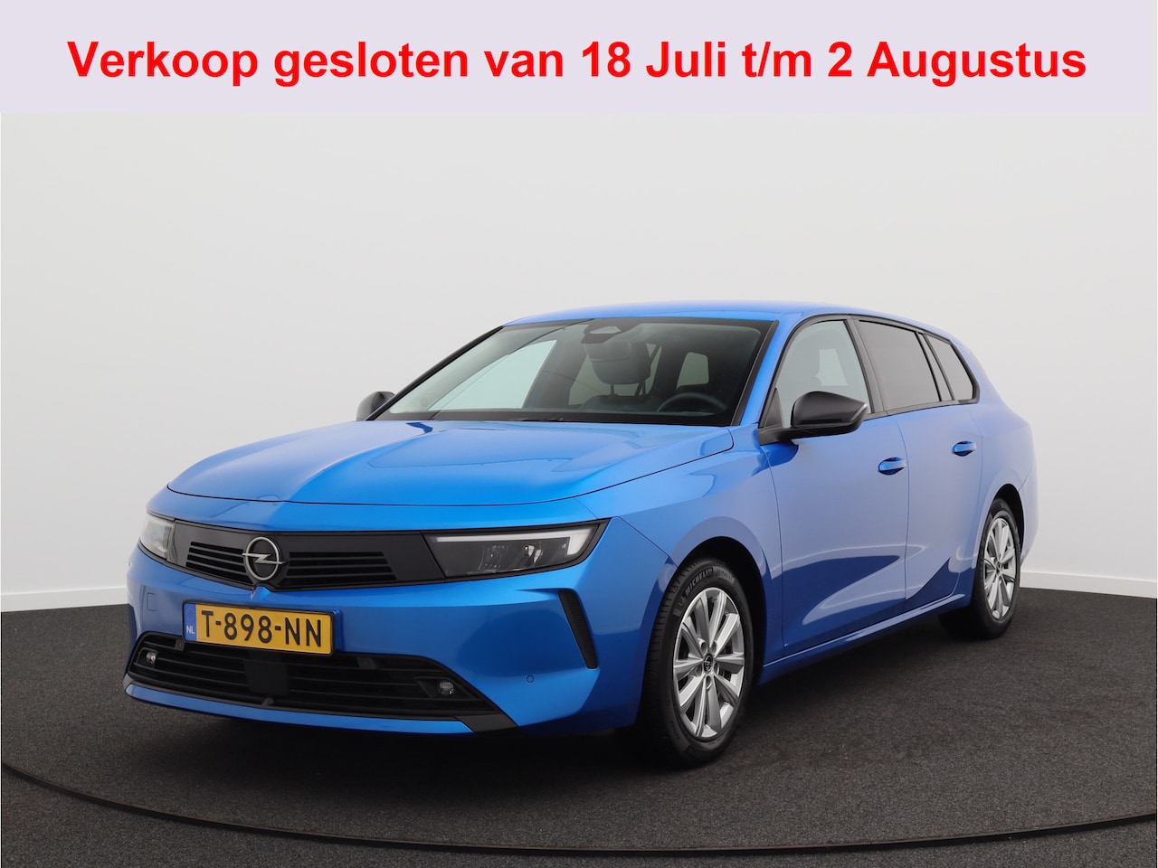 Opel Astra Sports Tourer - 1.2 Business Edition/ lage km/ zeer mooi! - AutoWereld.nl