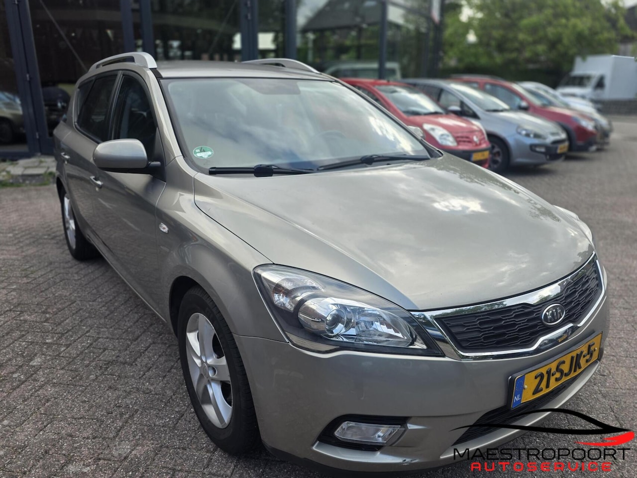 Kia Cee'd Sporty Wagon - 1.4 CVVT Navigator Plus Pack 1.4 CVVT Navigator Plus Pack - AutoWereld.nl