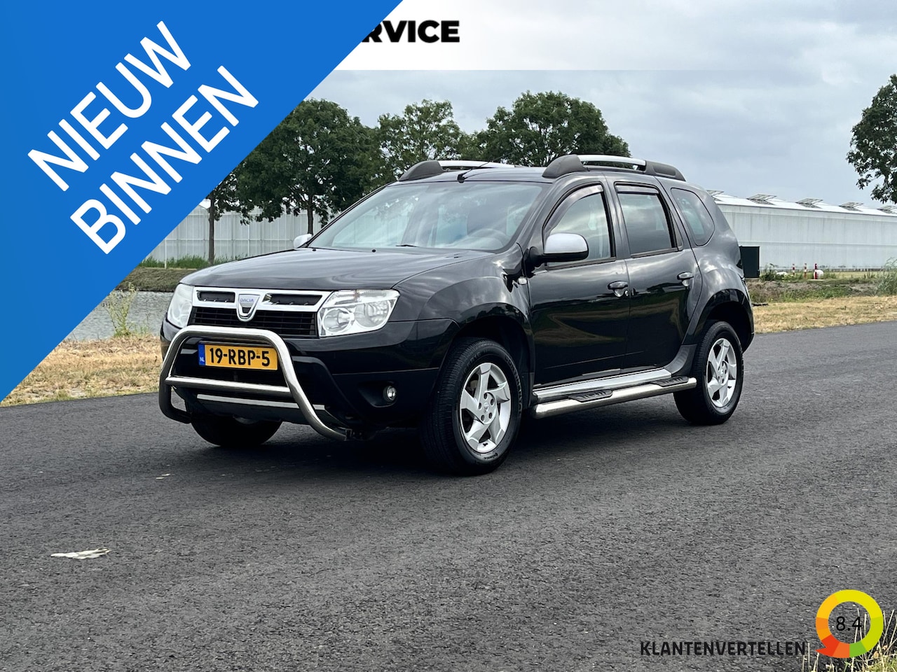 Dacia Duster - 1.6 Lauréate 2wd Airco, radio, trekhaak - AutoWereld.nl