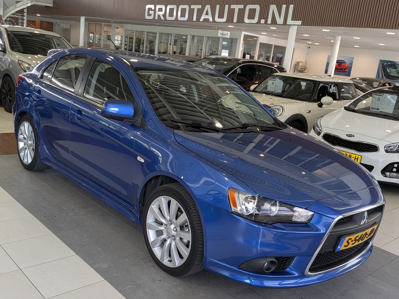 Mitsubishi Lancer Sportback - 1.8 Instyle Trekhaak, Airco, Cruise Control - AutoWereld.nl