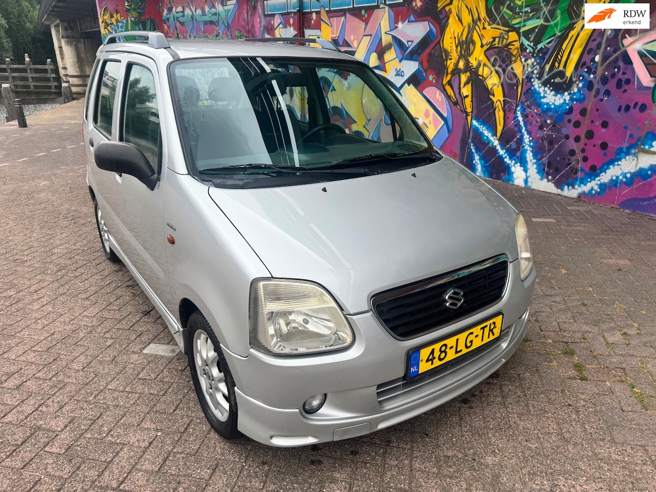 Suzuki Wagon R+ - 1.3 Special airco 150 dkm nap auto rijd perfect zeer nette auto hoge instap sportieve look - AutoWereld.nl