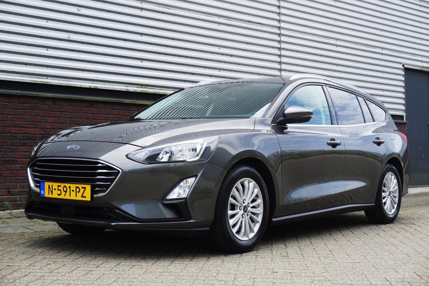 Ford Focus Wagon - 1.0 EcoB.125PK Titanium X Business/Trekhaak/ Dealeronderhouden. - AutoWereld.nl