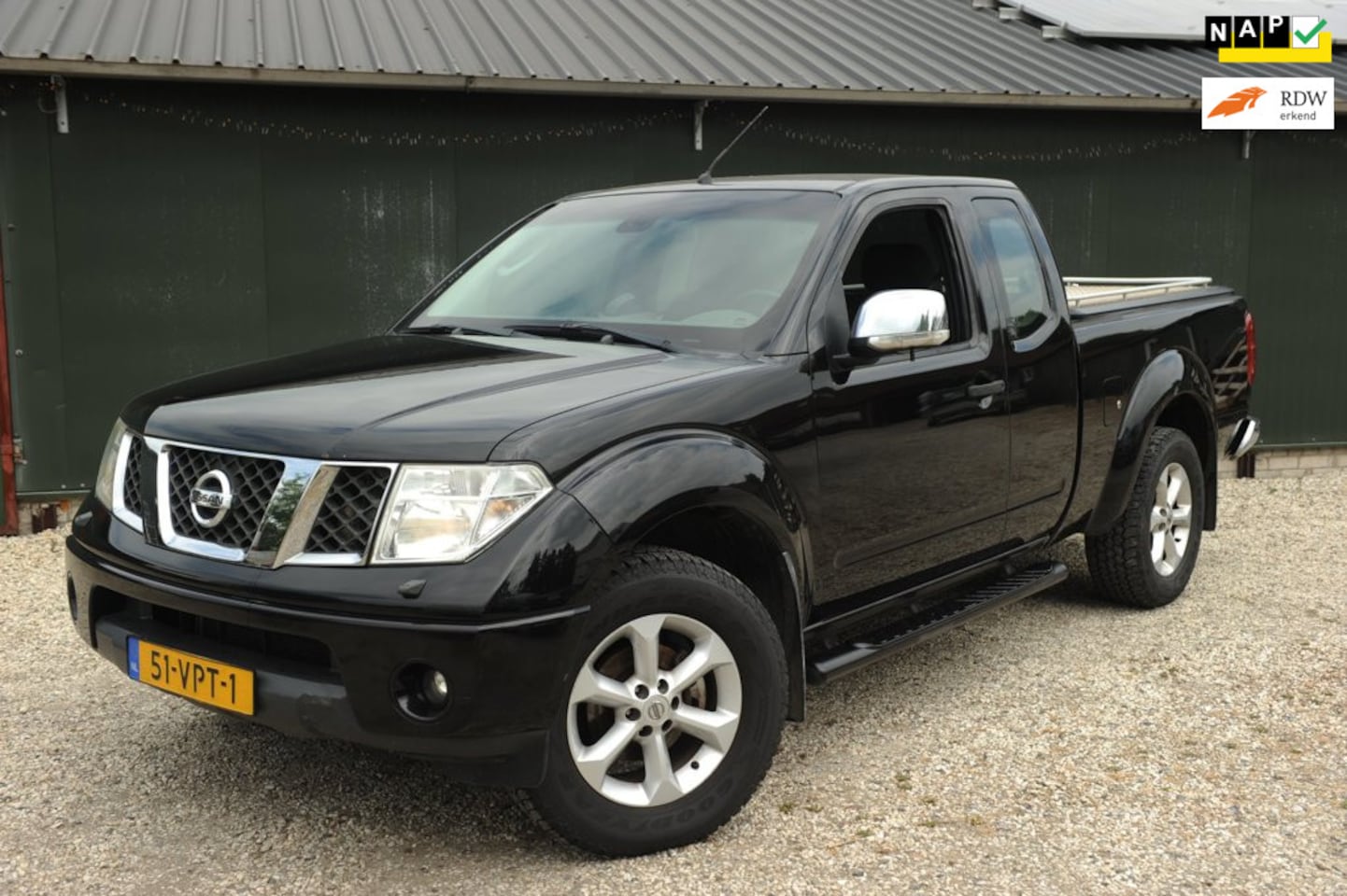 Nissan Navara - 2.5 dCi LE Double Cab/AIRCO/4X4/CLIMA/ABS/LMV/TOPBOX/ - AutoWereld.nl