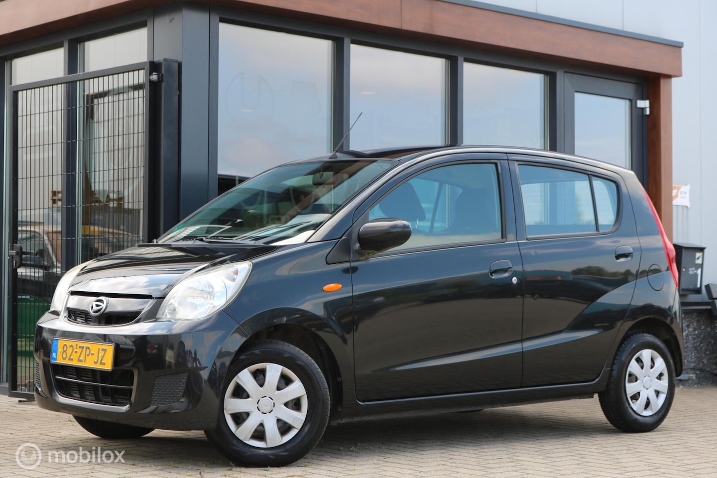 Daihatsu Cuore - 1.0 Trend | Airco - AutoWereld.nl