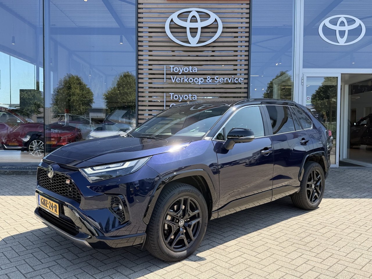 Toyota RAV4 - 2.5 Hybrid AWD GR SPORT Limited Automaat 222pk | Schuif-/kanteldak | JBL-audio | Rondomzic - AutoWereld.nl