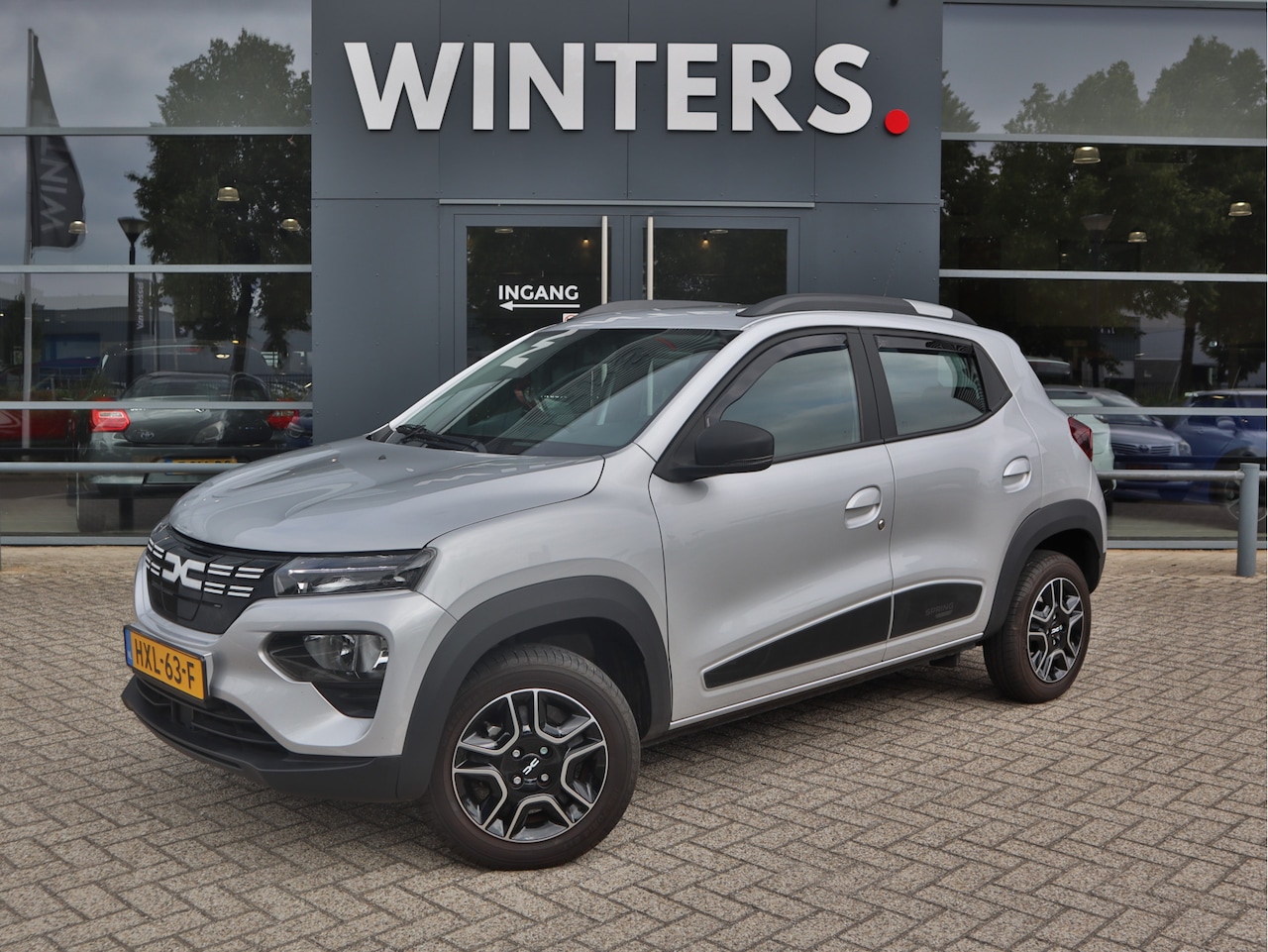 Dacia Spring - Expression 27 kWh | LM velgen | Airco | Dakrails | ZEER MOOI | WEINIG KILOMETERS - AutoWereld.nl