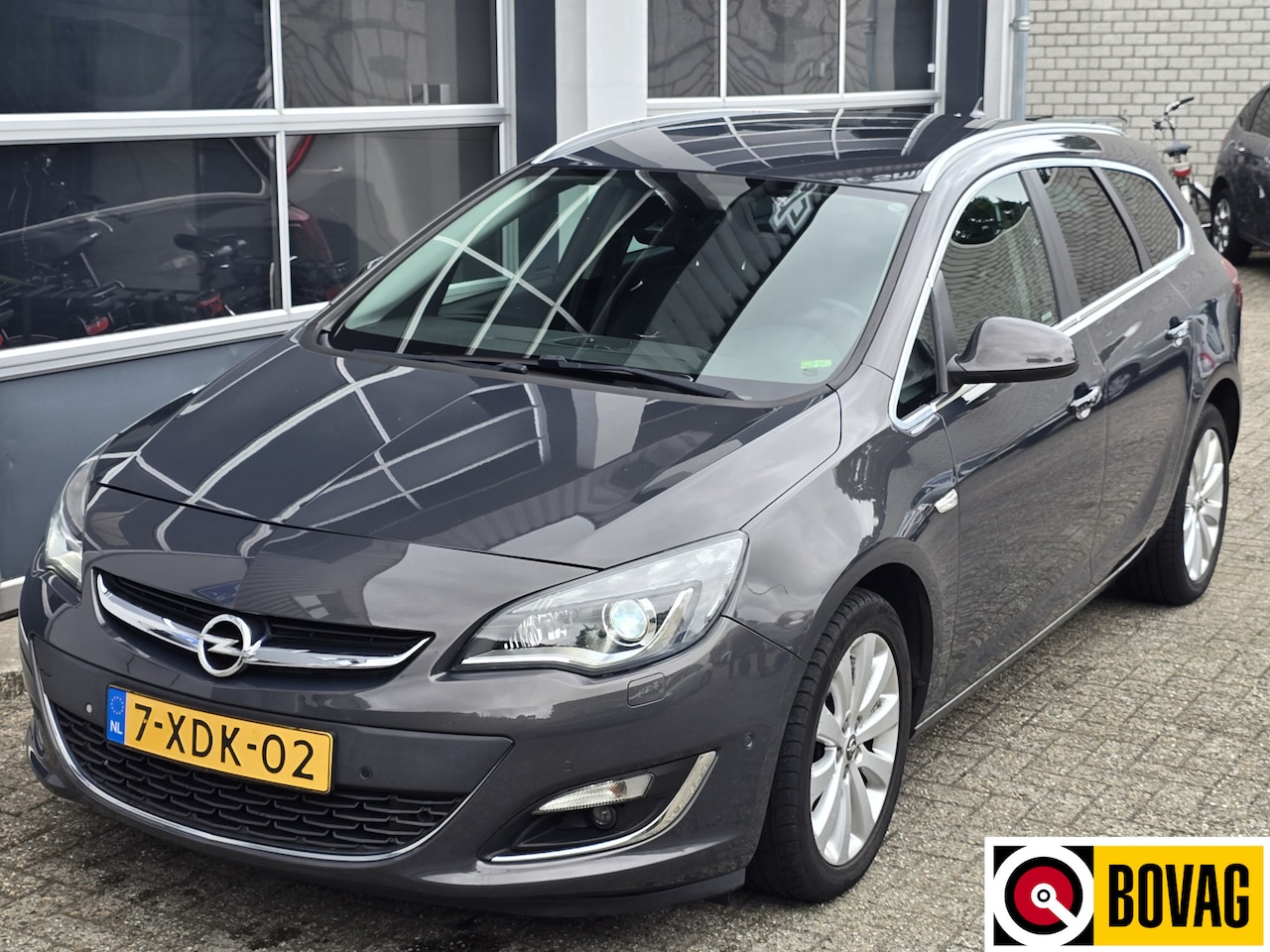Opel Astra Sports Tourer - 1.4 Turbo Sport 1.4 Turbo Sport - AutoWereld.nl