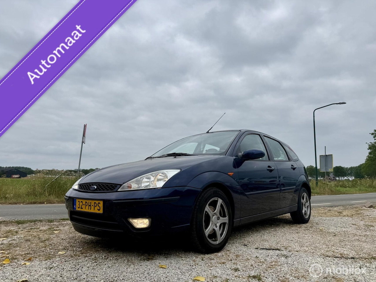 Ford Focus - 1.6-16V Ghia 1.6-16V Ghia, BJ 2004, Automaat, APK Juli 2027 - AutoWereld.nl