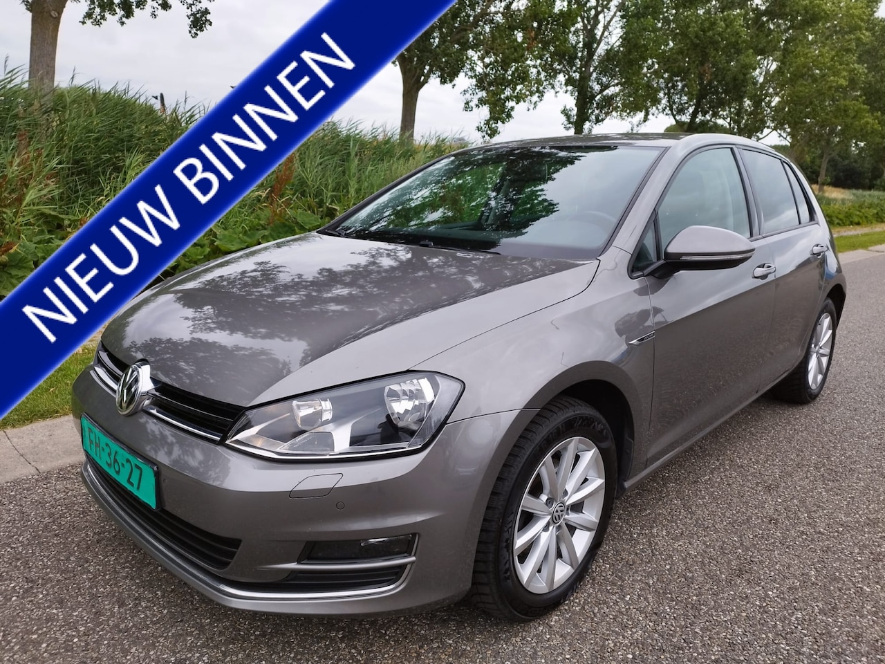 Volkswagen Golf - 1.2 TSI Lounge ** 1e eig ** NAVI ** Clima ** Bluetooth ** Wi pakket ** NW STAAT ** - AutoWereld.nl