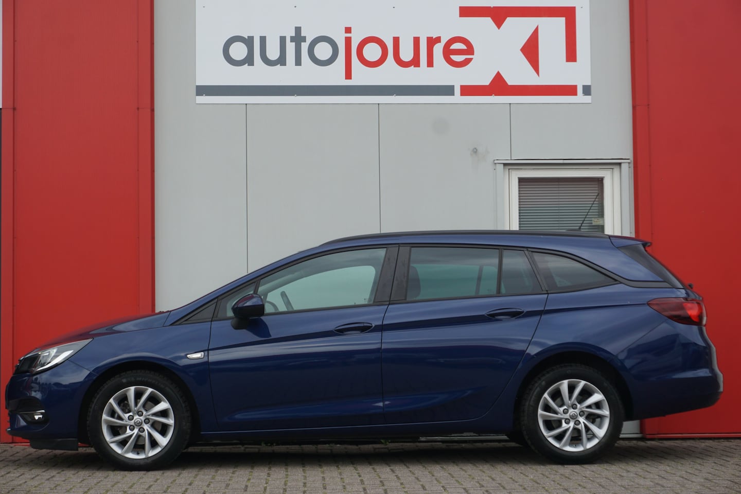 Opel Astra Sports Tourer - 1.4 Automaat Business Edition | Navigatie | Camera | Origineel NL | - AutoWereld.nl