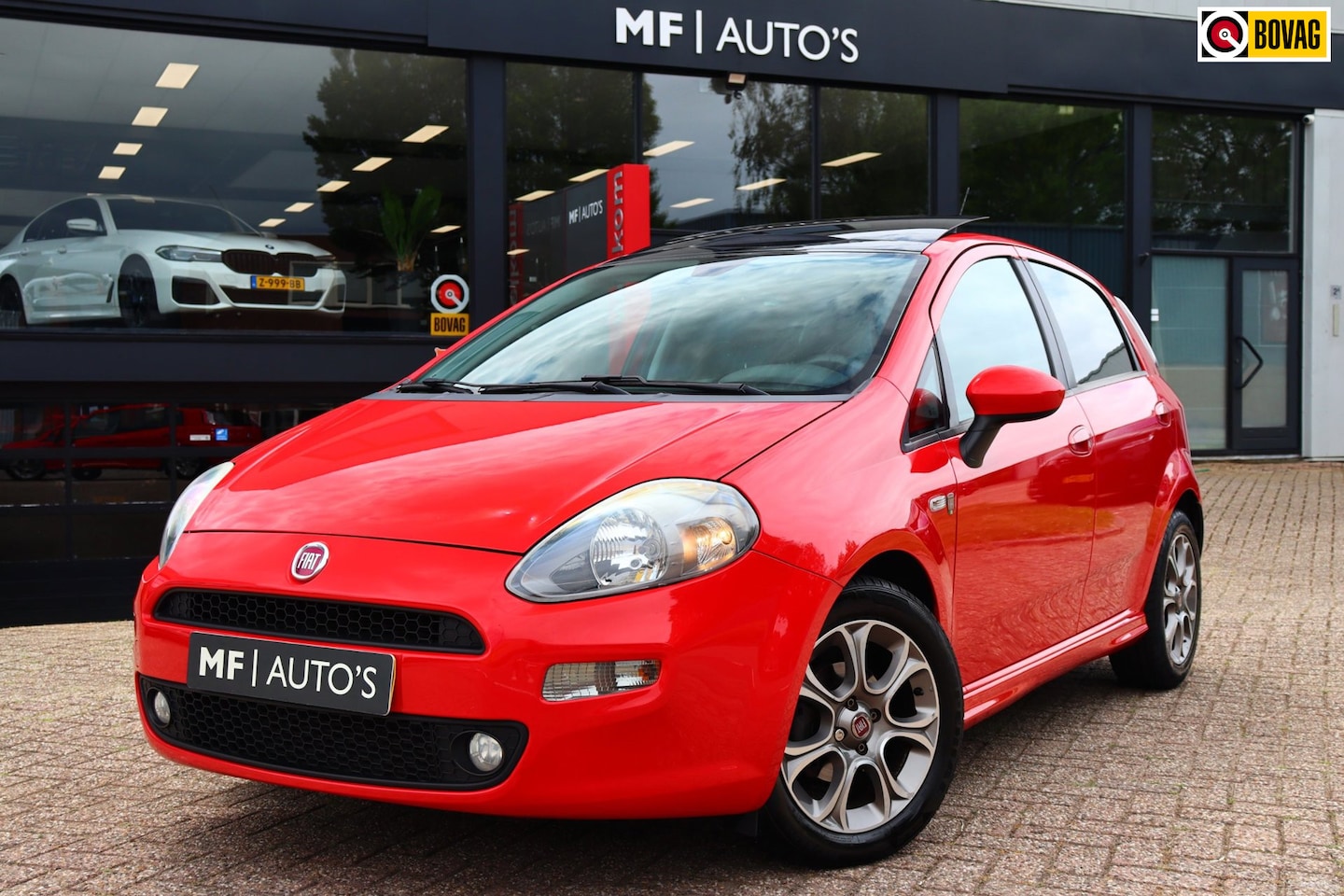 Fiat Punto Evo - 0.9 TwinAir Lounge|Pano|PDC|Clima|NL Auto NAP - AutoWereld.nl