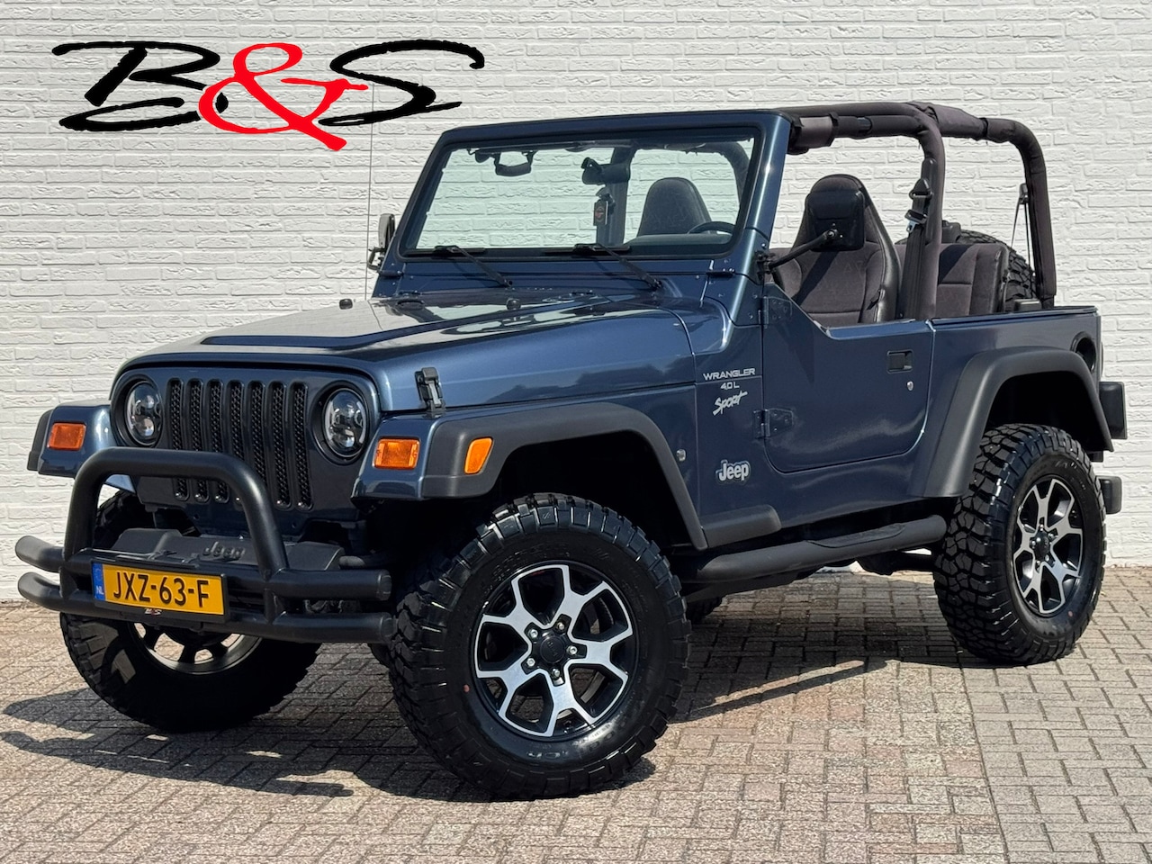 Jeep Wrangler - 4.0i Sport Hardtop 4X4 Led koplampen. - AutoWereld.nl