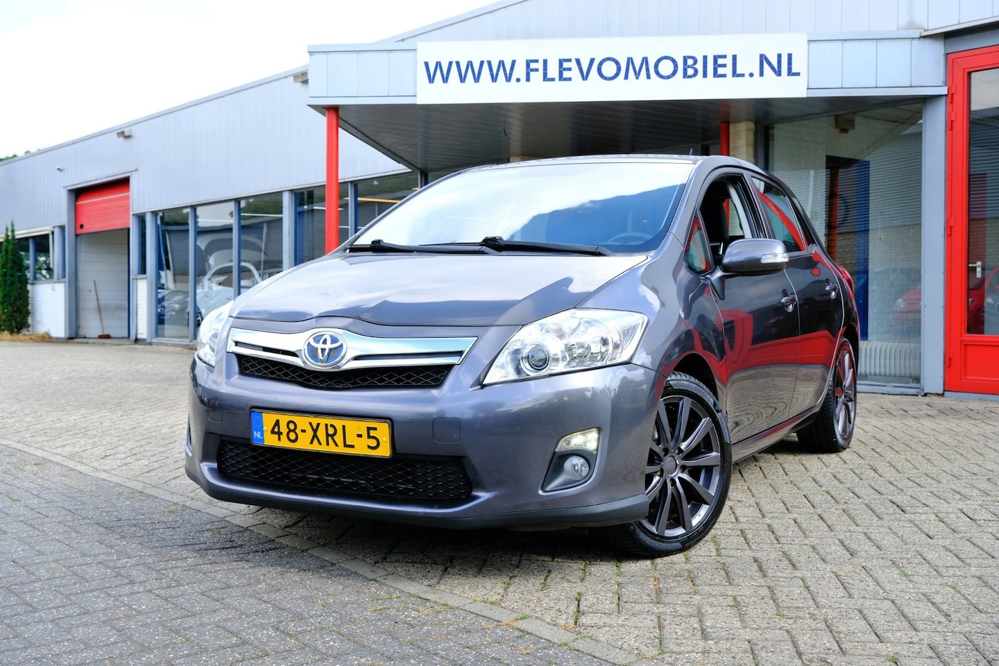 Toyota Auris - 1.8 Full Hybrid Business Aut. *Unieke Auto!* Navi|1e Eig|Clima|Cam|LMV - AutoWereld.nl