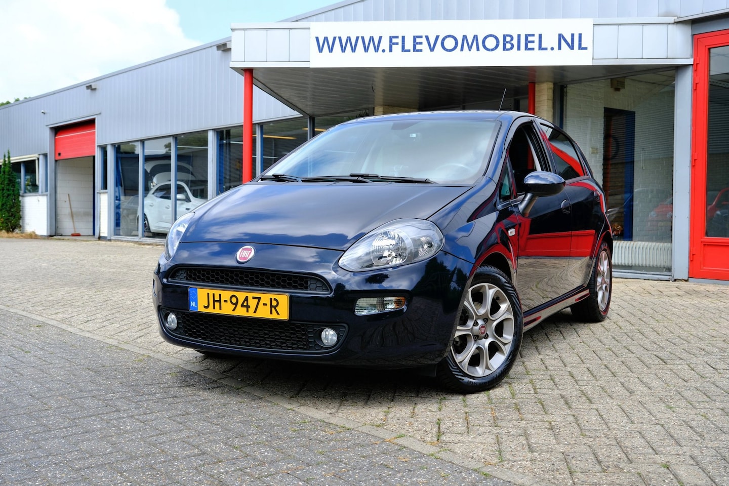 Fiat Punto Evo - 0.9 TwinAir Lounge 5-drs Navi|1e Eig|Clima|LMV|Cruise - AutoWereld.nl