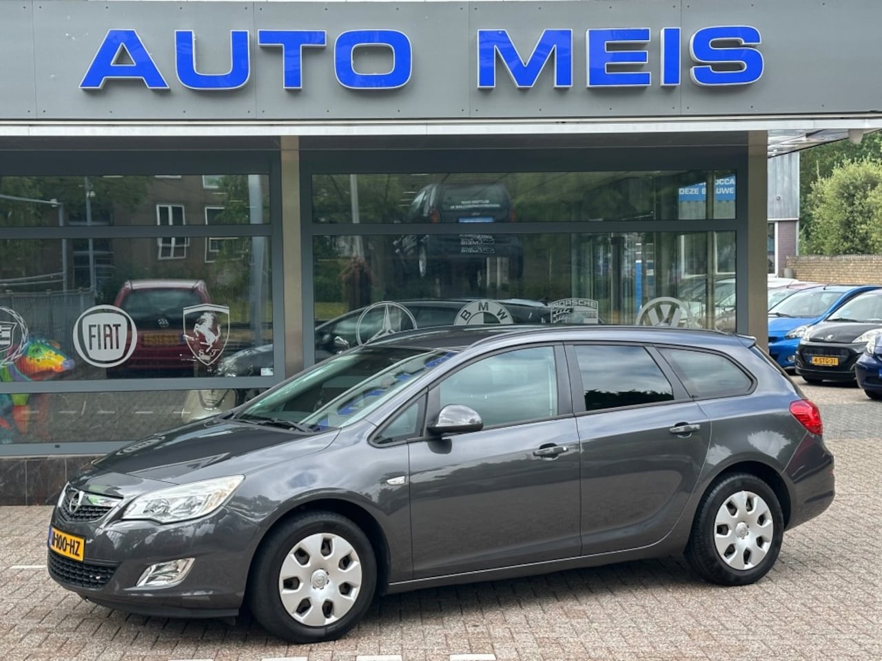 Opel Astra - 1.6 Sport Automaat Navi Cruise Airco - AutoWereld.nl