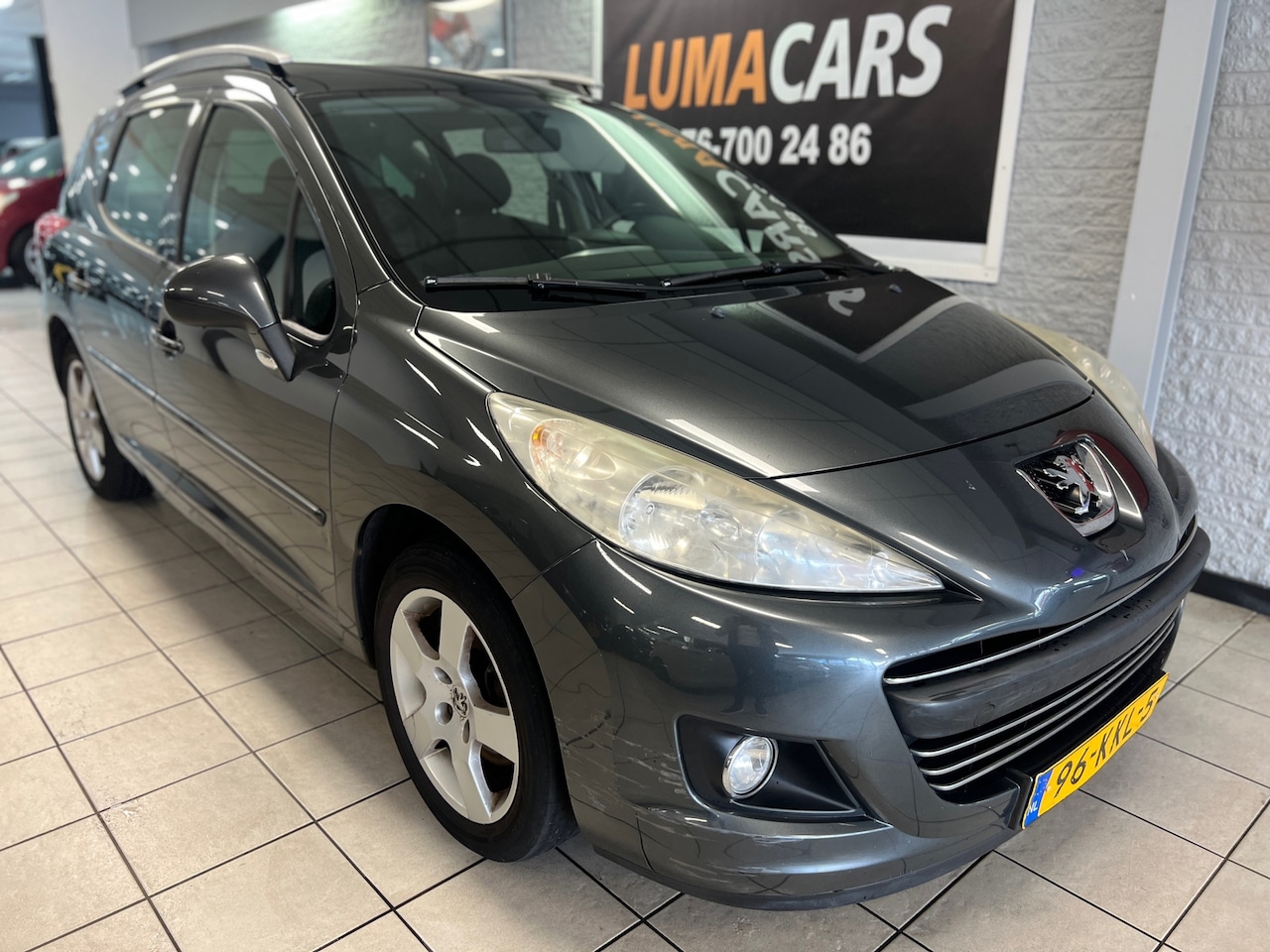 Peugeot 207 SW - 1.6 VTi Première | Pano | cruise | Navi | - AutoWereld.nl