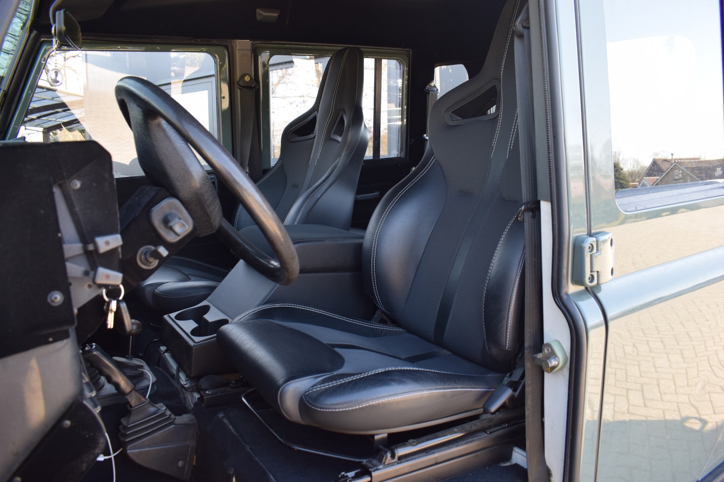 Land Rover Defender 130 - 2.5 Td5 SW 130" SE Keswick Green | Sawtooth | Ledbar | Roofrack - AutoWereld.nl