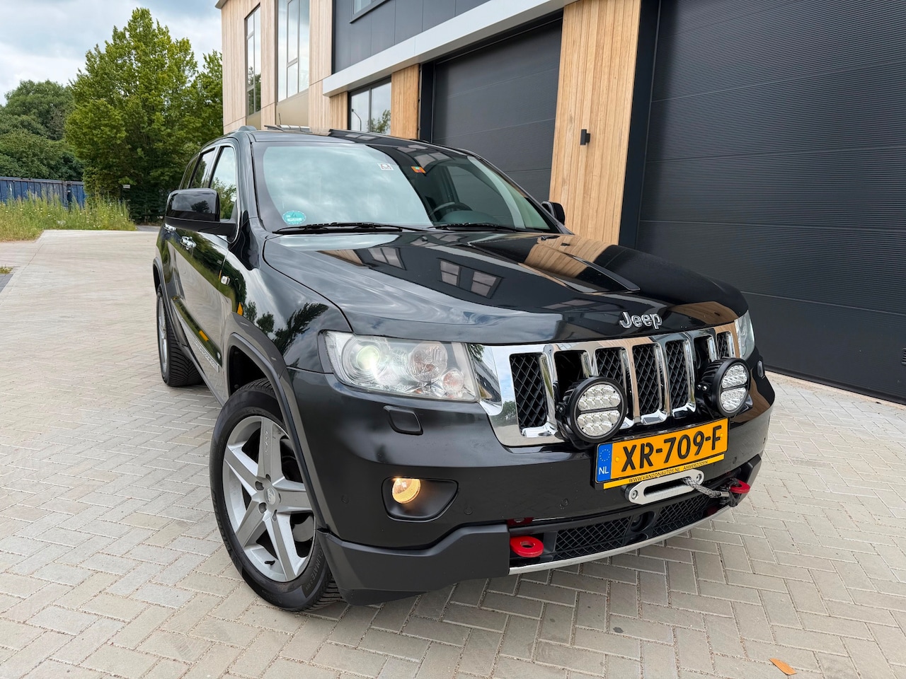 Jeep Grand Cherokee - 3.0 CRD Overland 4X4 PANO|LEER|LUCHTV|CAMERA|VOL OPTIES - AutoWereld.nl
