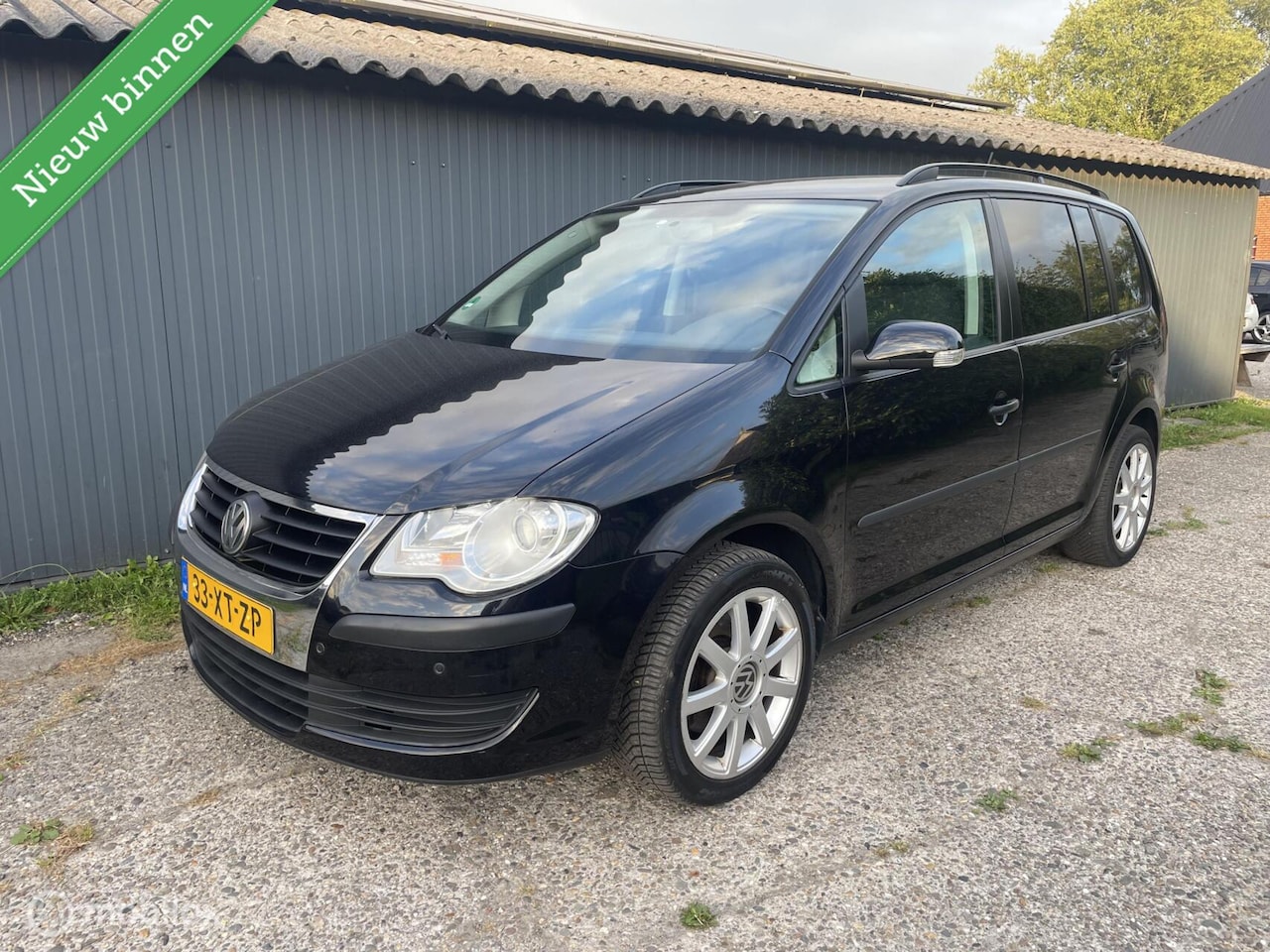 Volkswagen Touran - 1.4 TSI Trendline Business Cruise Clima Trekhaak - AutoWereld.nl
