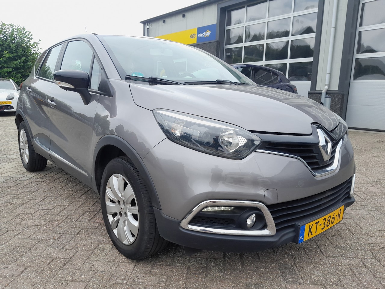 Renault Captur - 0.9 TCe Limited - Navigatie - Trekhaak - AutoWereld.nl
