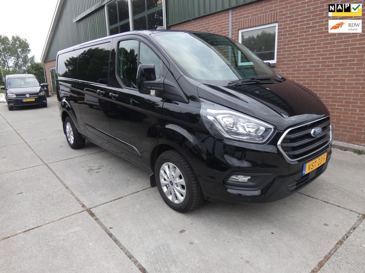 Ford Transit Custom - 300 2.0 TDCI L2H1 Limited*aut*navi/camera - AutoWereld.nl