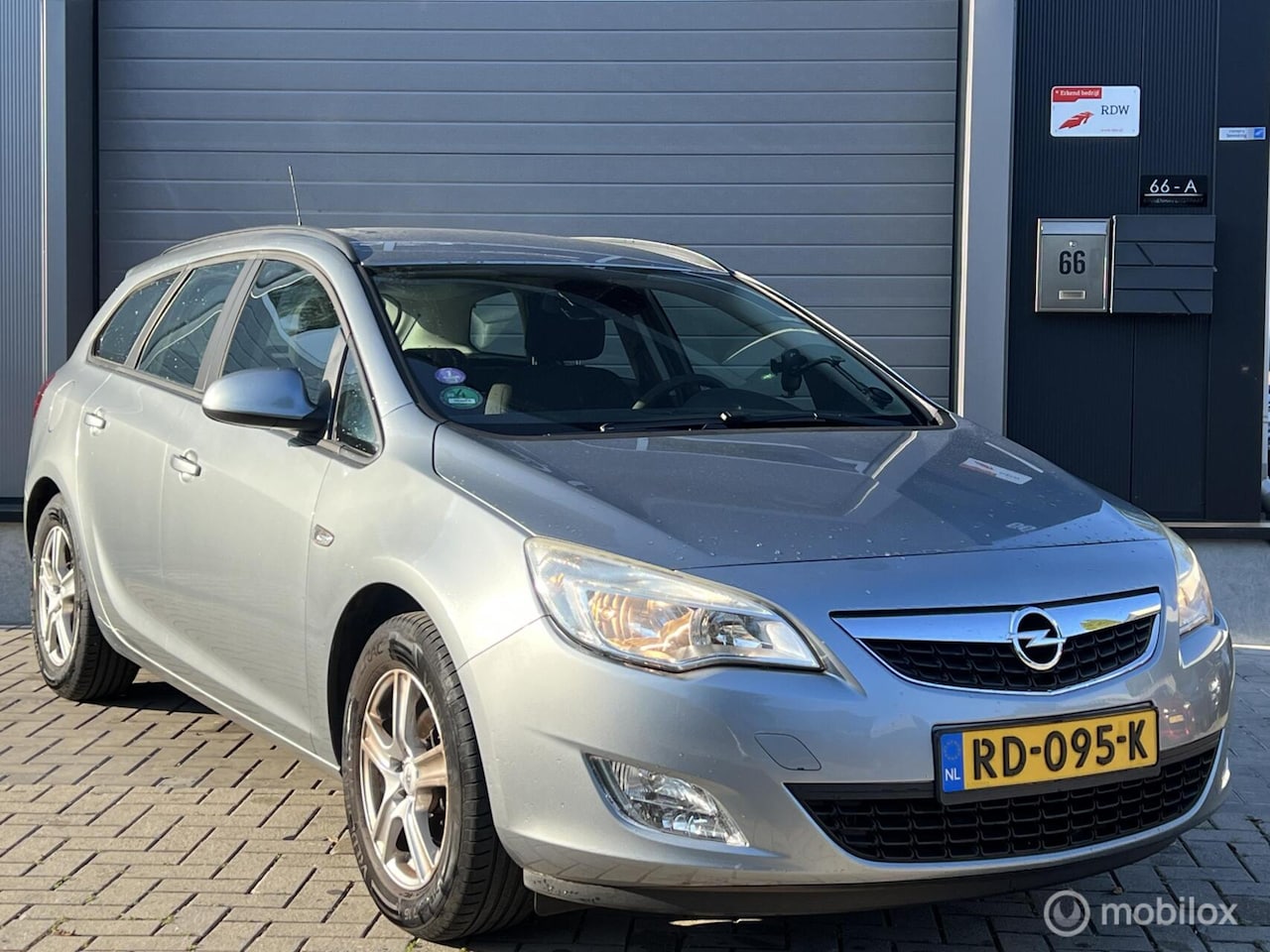 Opel Astra Sports Tourer - 1.4 Turbo Sport 1.4 Turbo Sport - AutoWereld.nl