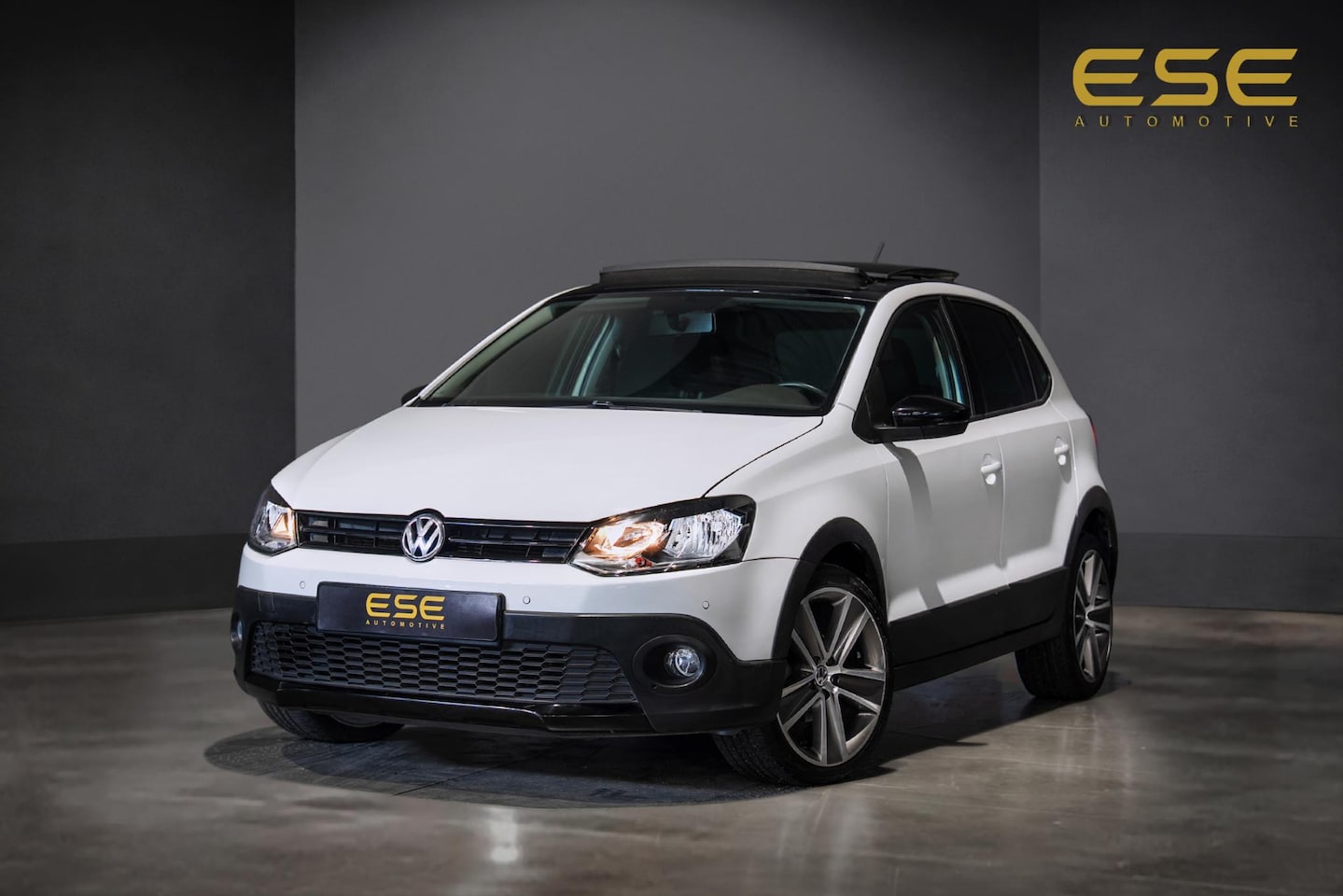 Volkswagen Polo - 1.2 TSI Cross | Airco | Cruise | Panorama | Parkeersensoren - AutoWereld.nl