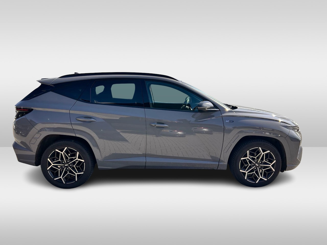 Hyundai Tucson - 1.6 T-GDI HEV Premium Sky N-Line / Trekhaak / Panoramadak / 360Camera / 19'' / Leder&Alcan - AutoWereld.nl