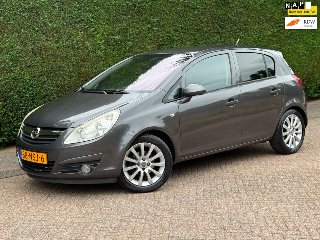 Opel Corsa - 1.2-16V Cosmo /AUTOMAAT/CRUISE/AIRCO/PDC/RIJDTSUPER!/ - AutoWereld.nl