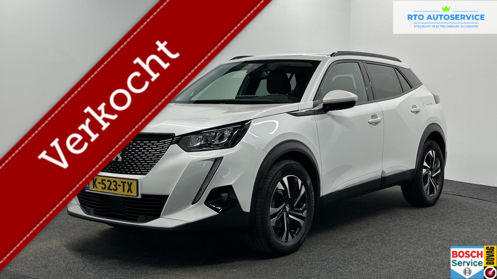 Peugeot 2008 - 1.2 PureTech Blue Lease Allure CAMERA CARPLAY NAVI ECC CRUISE. - AutoWereld.nl