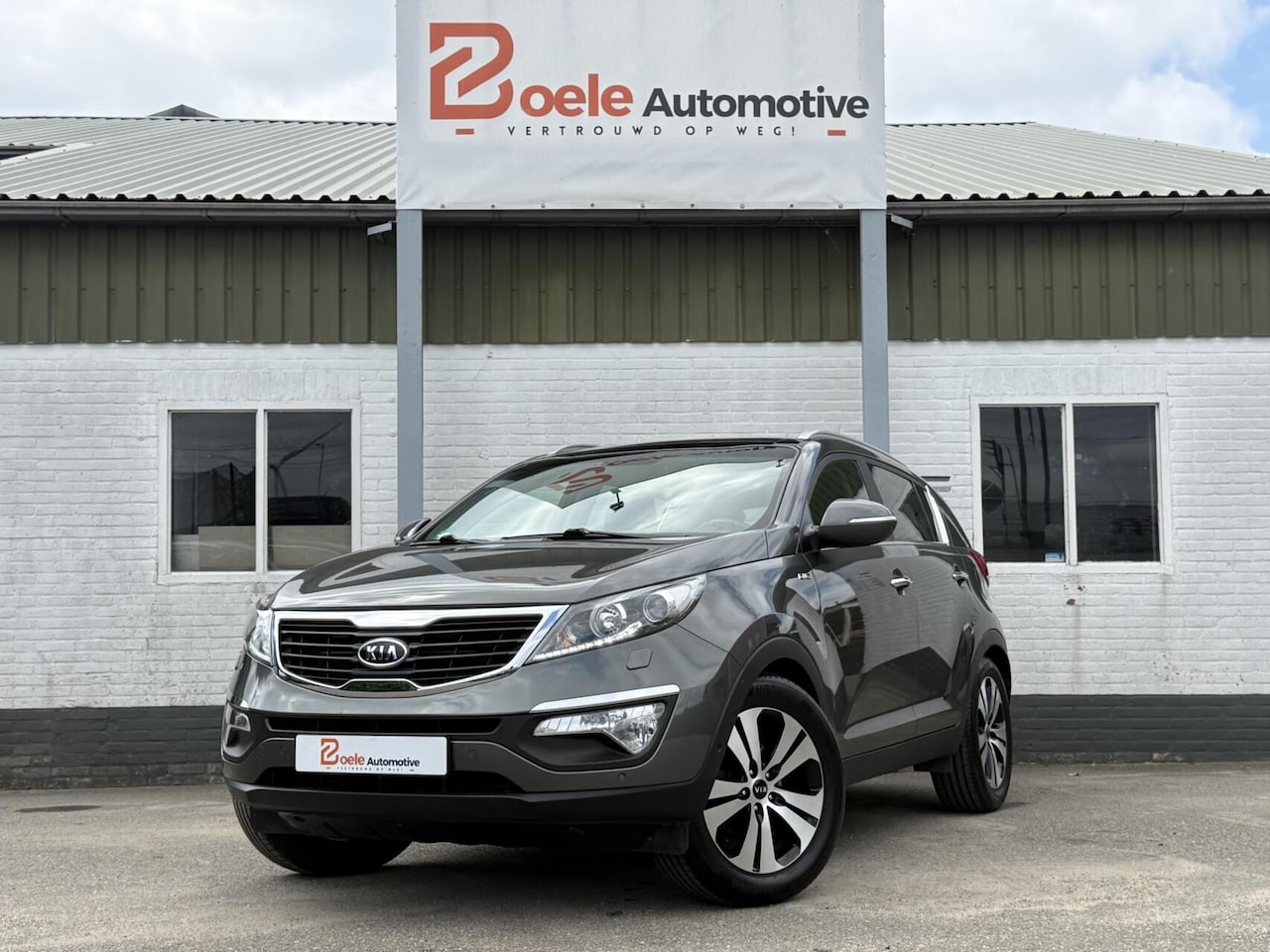 Kia Sportage - 2.0 X-clusive 4WD Aut. / Pano. dak / Full Options / Xenon / Trekhaak - AutoWereld.nl