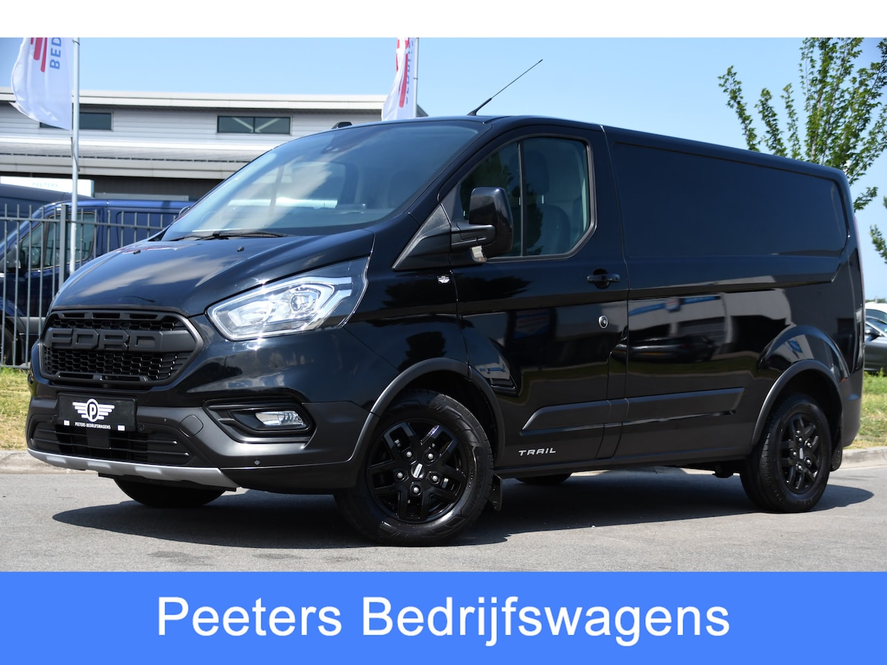 Ford Transit Custom - 300 2.0 TDCI L1H1 Trail Camera, Cruise, Carplay, LED, Stoelverwarming, Leder, LM Velgen, 1 - AutoWereld.nl