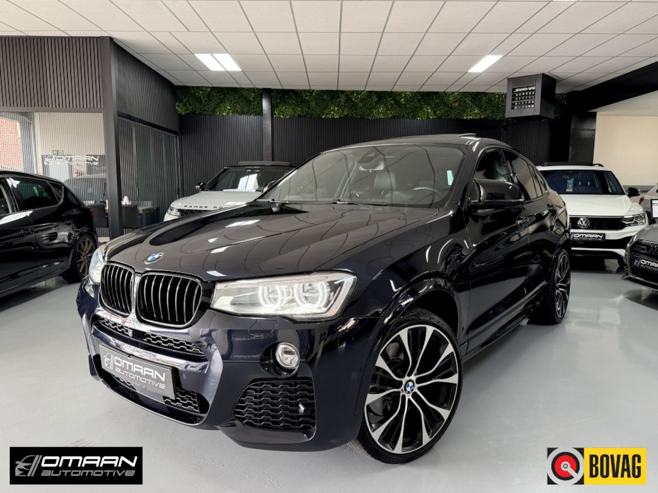 BMW X4 - M40i M-Sport SCHUIFDAK HUD LEER 21'' - AutoWereld.nl