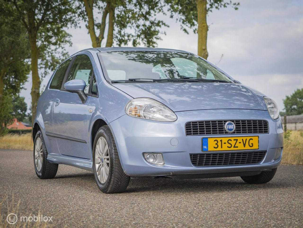 Fiat Grande Punto - 1.4 Edizione Blue & Me 1.4 Edizione Blue & Me - AutoWereld.nl