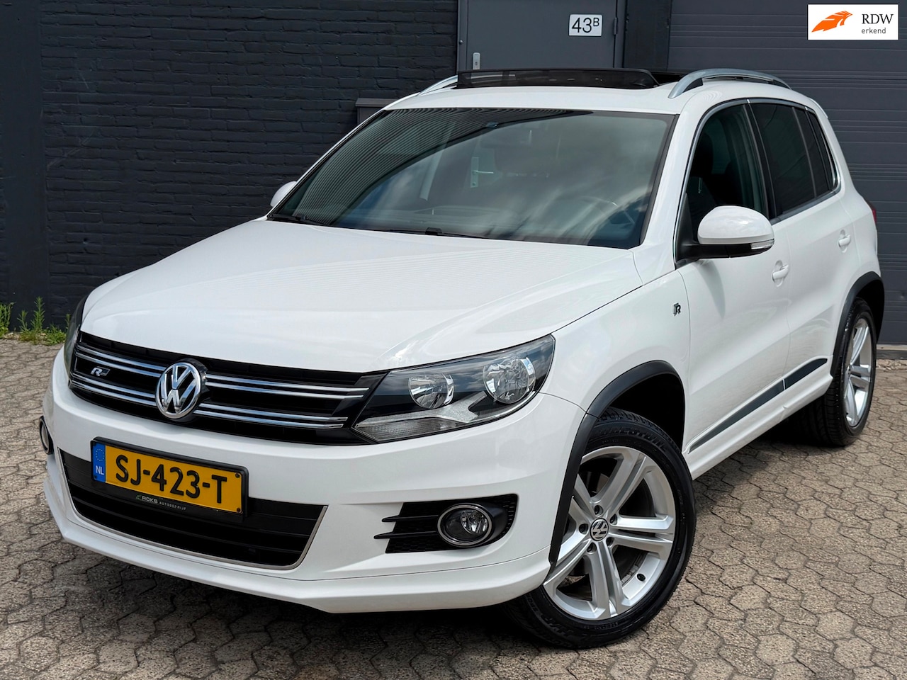 Volkswagen Tiguan - 2.0 TSI R-line 4Motion|PANO|LEER|NAVI|CLIMA|CRUISE - AutoWereld.nl